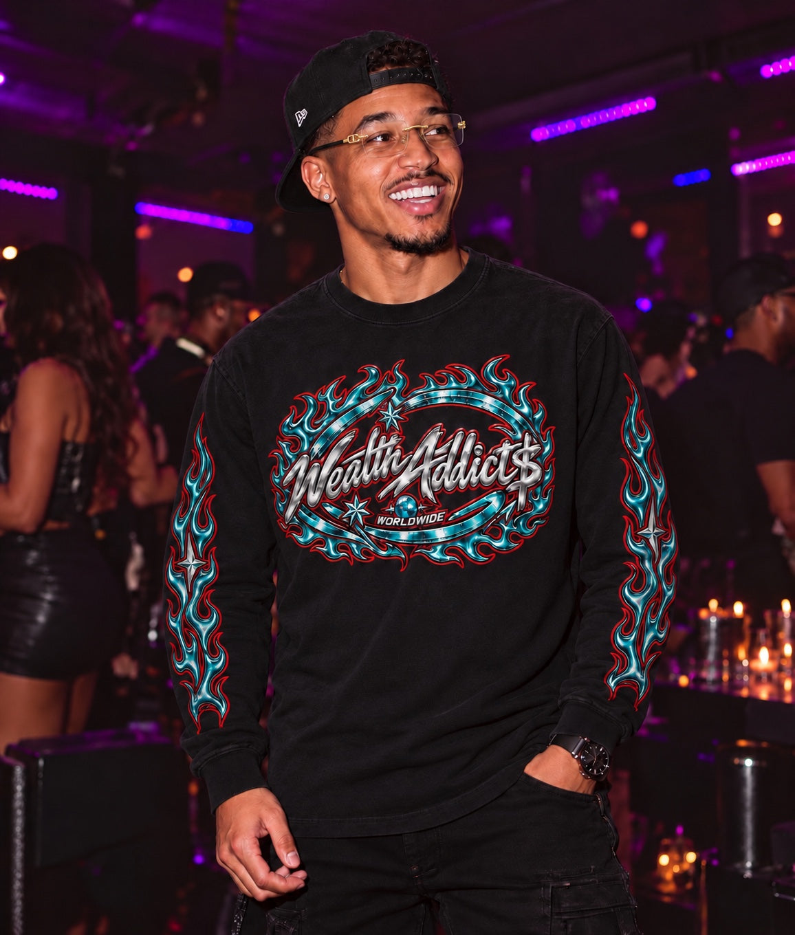 Wealth Addict$ Worldwide men's collection campaign in teal and red graphic long sleeve